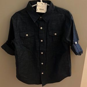 Never worn navy blue boys size 5 button down.